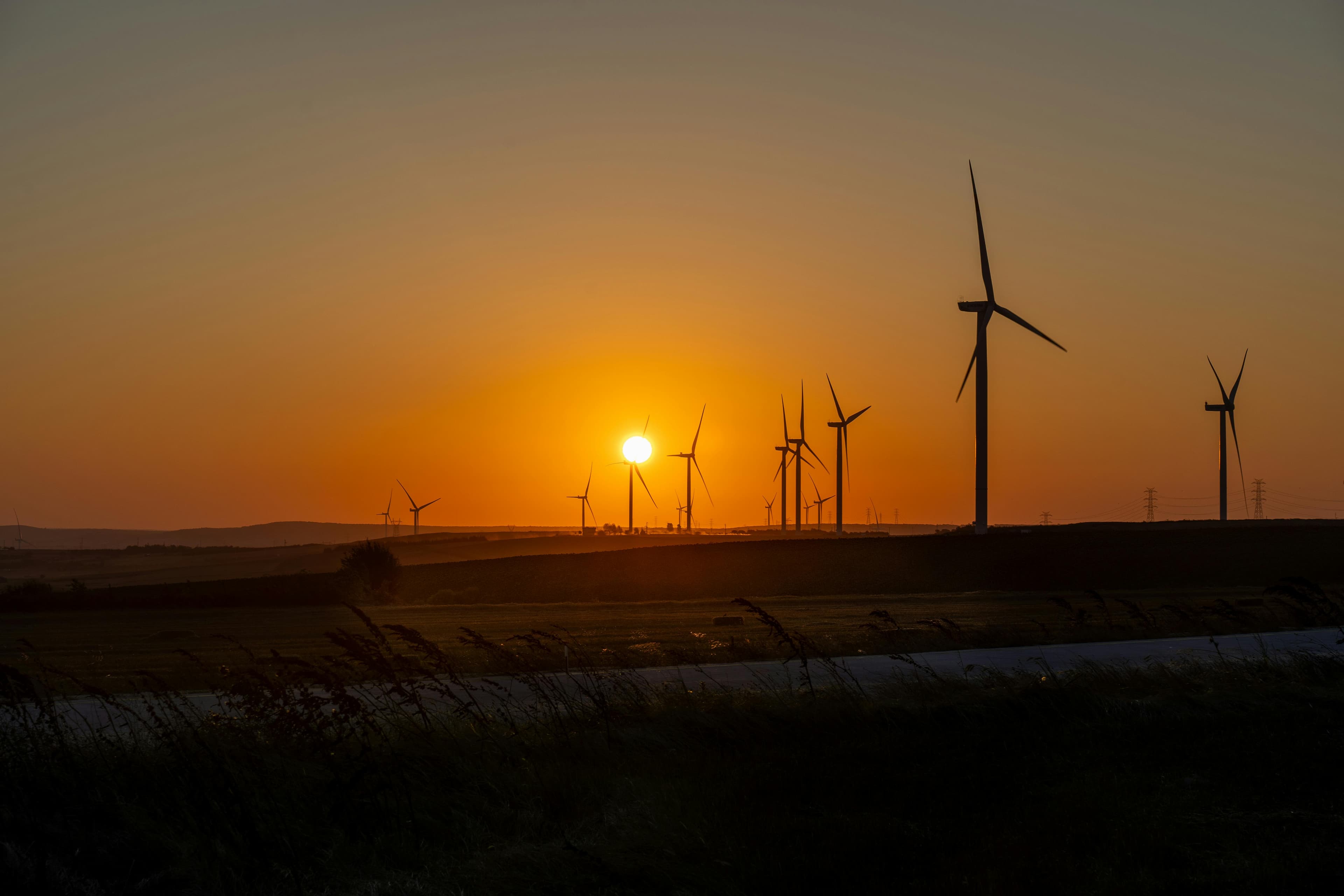 Wind turbines at sunset